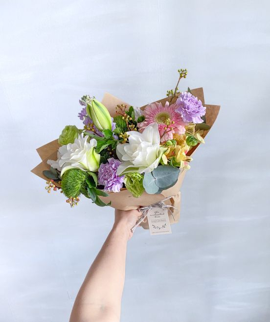 Roselilies, Carnations, Green Trick, Gerbera in Wrapped Bouquet